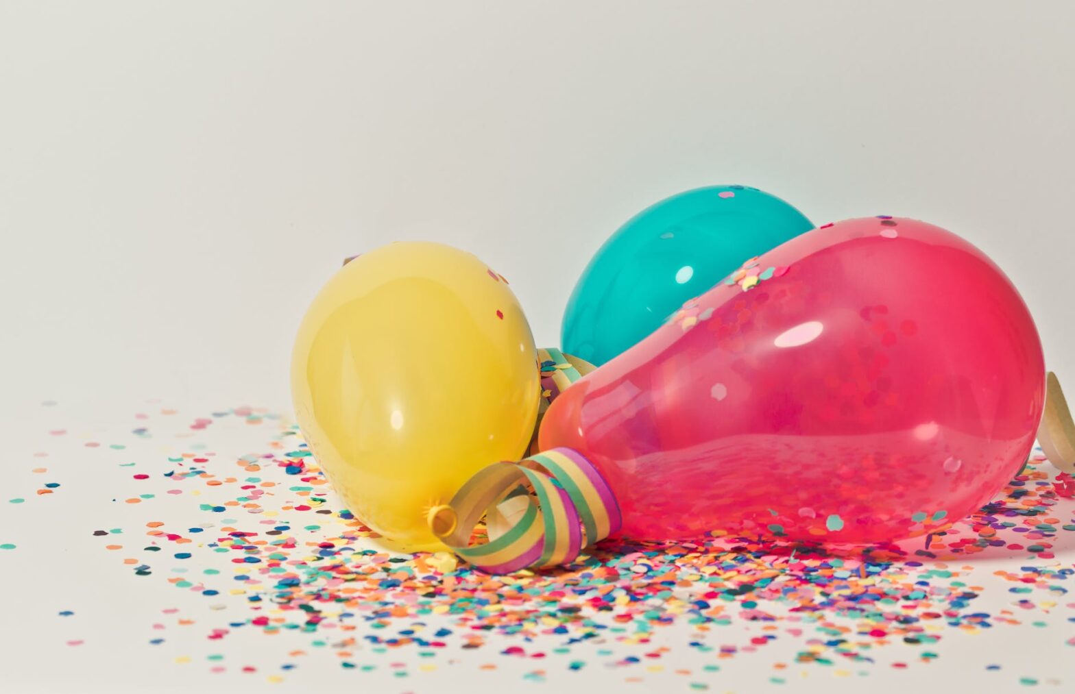 colorful balloons with confetti